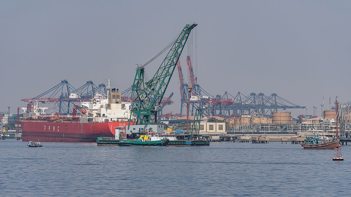 Container cranes and a cargo ship at Karachi port.